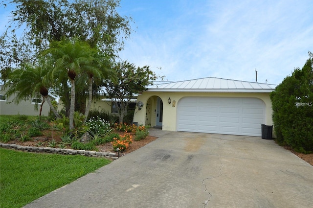 single story home featuring a garage