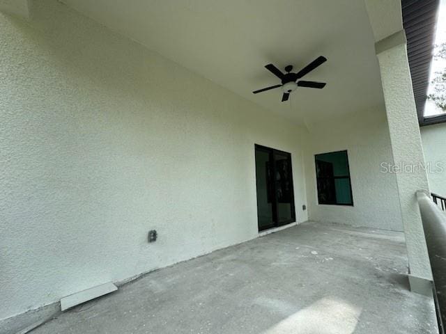 view of patio / terrace featuring ceiling fan