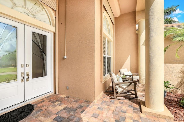 doorway to property featuring french doors