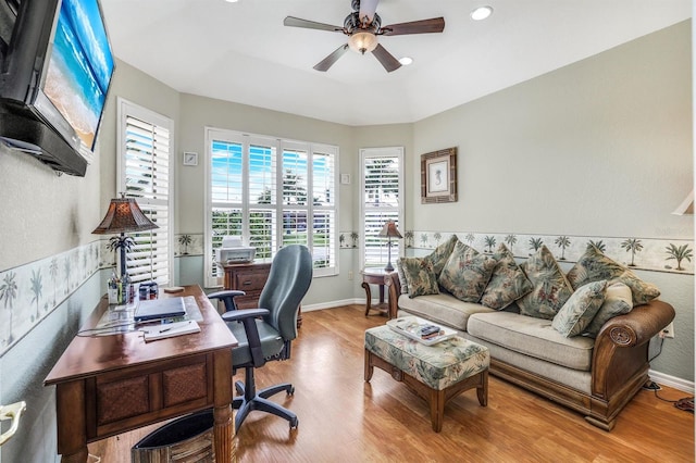 home office featuring ceiling fan and light wood-type flooring