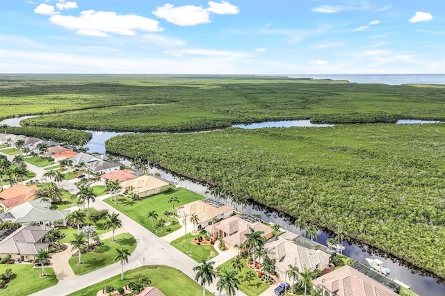 aerial view featuring a rural view and a water view