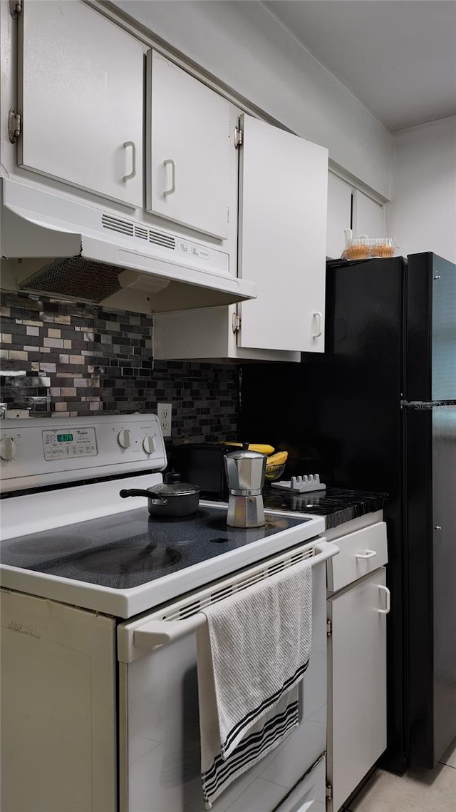 kitchen featuring white electric range oven, white cabinetry, and tasteful backsplash