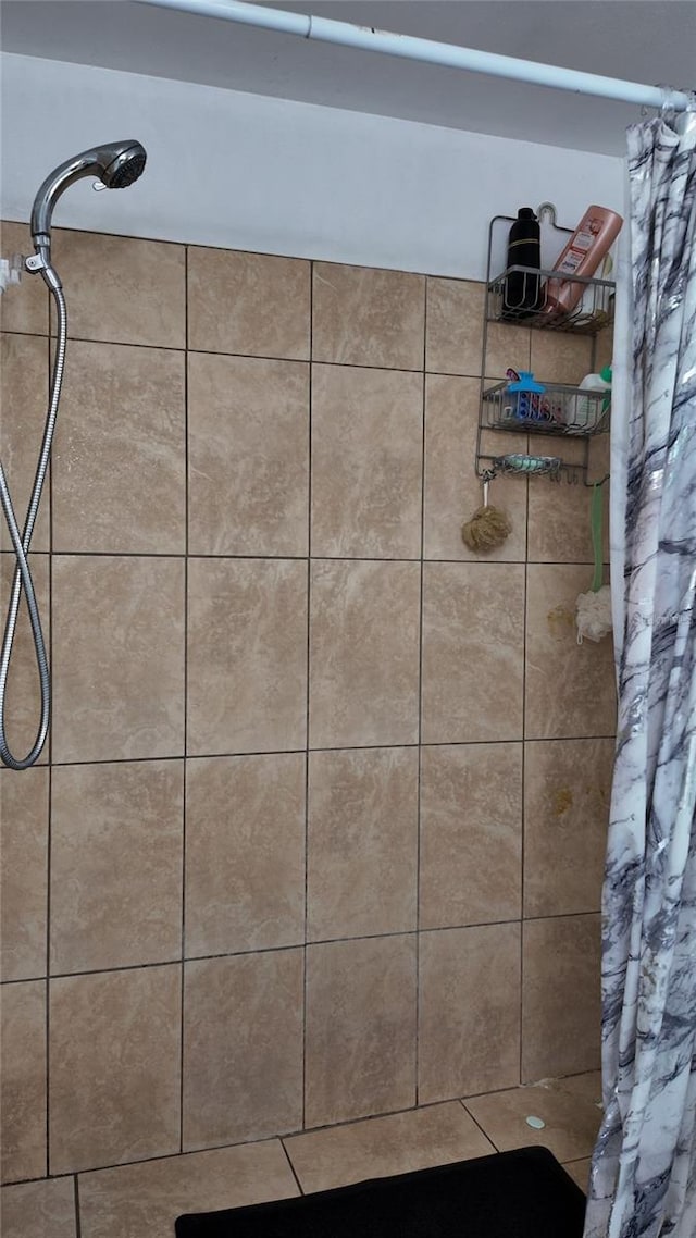 bathroom featuring walk in shower