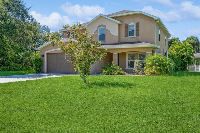 view of front of house with a garage and a front yard