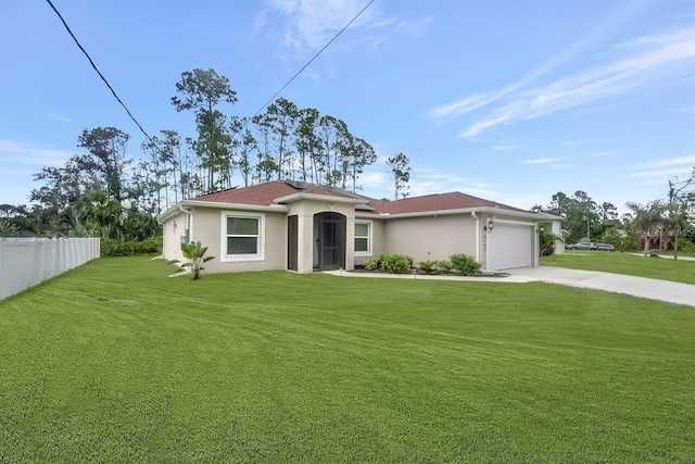 view of front facade with a garage and a front yard