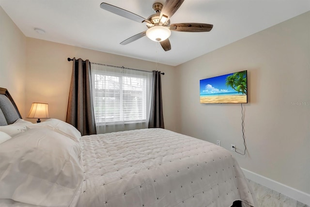 bedroom featuring ceiling fan