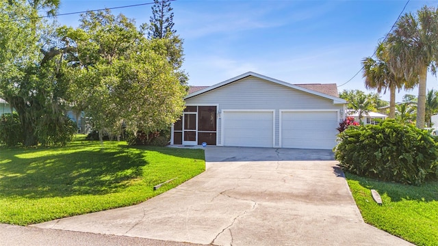 view of front of home with a garage and a front yard