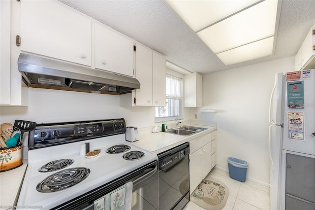 kitchen with white appliances, a textured ceiling, light tile patterned floors, sink, and white cabinets