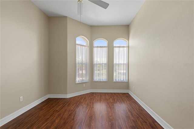 unfurnished room with hardwood / wood-style floors and ceiling fan