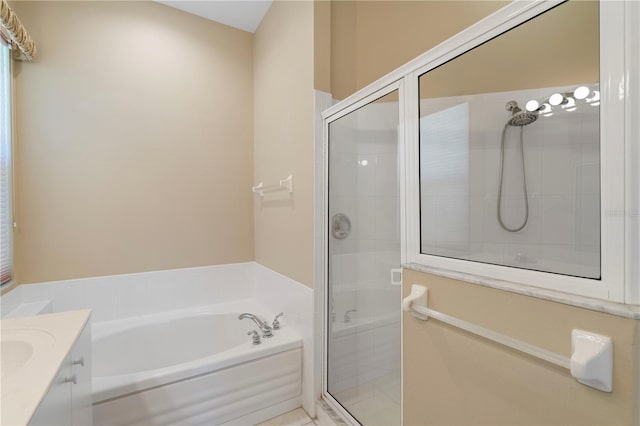 bathroom with shower with separate bathtub and vanity