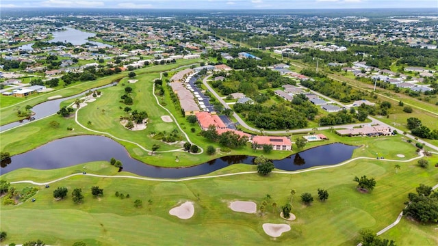 aerial view with a water view and golf course view