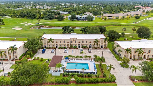 birds eye view of property featuring view of golf course