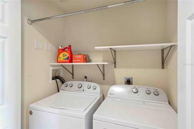 laundry area featuring laundry area and separate washer and dryer