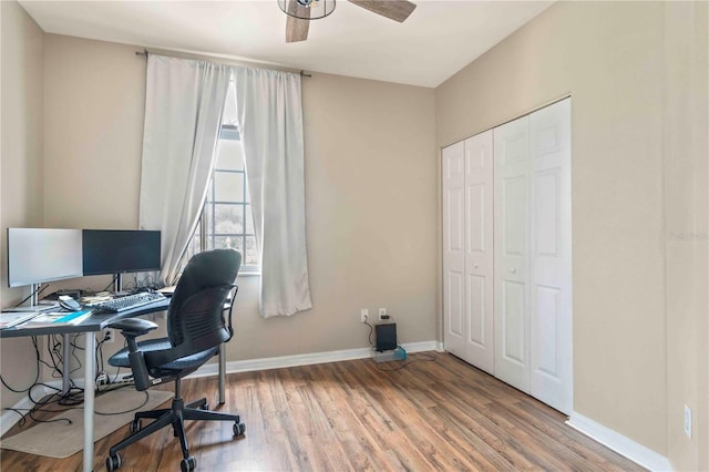 office area with hardwood / wood-style floors and ceiling fan