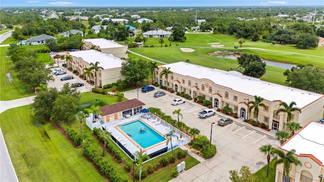 bird's eye view with view of golf course