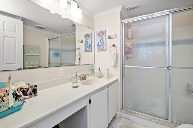 bathroom featuring walk in shower, tile patterned flooring, crown molding, and vanity