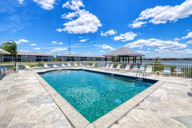 view of swimming pool with a patio area