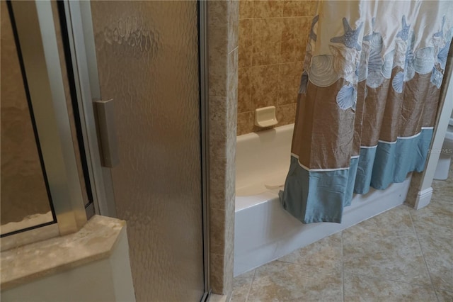 bathroom with tile patterned floors