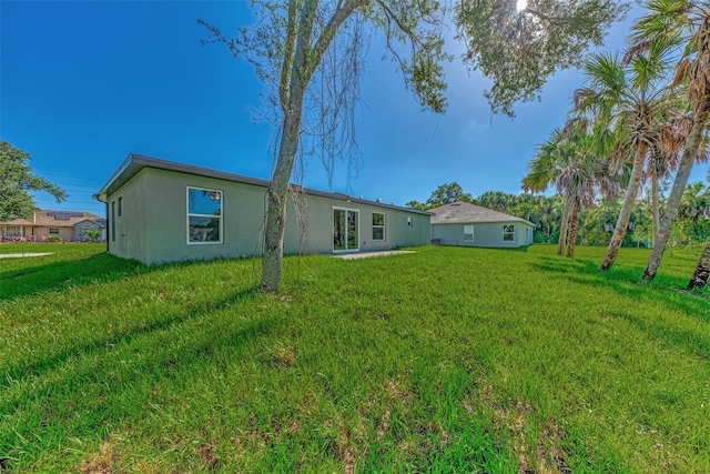 exterior space with a lawn