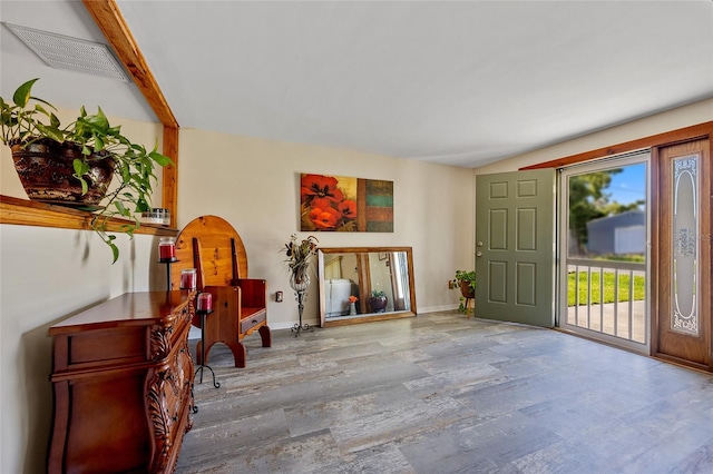 entrance foyer featuring hardwood / wood-style floors