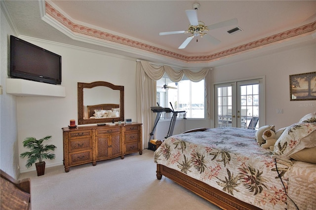 bedroom featuring access to outside, french doors, ornamental molding, light carpet, and ceiling fan