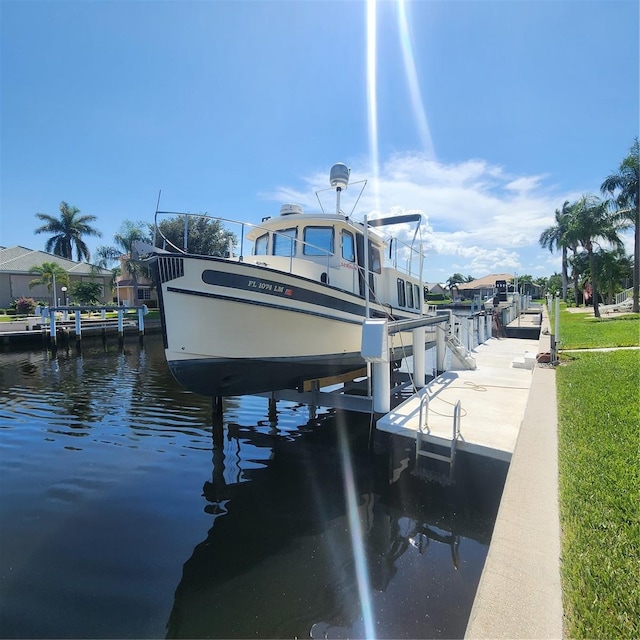 view of dock with a water view