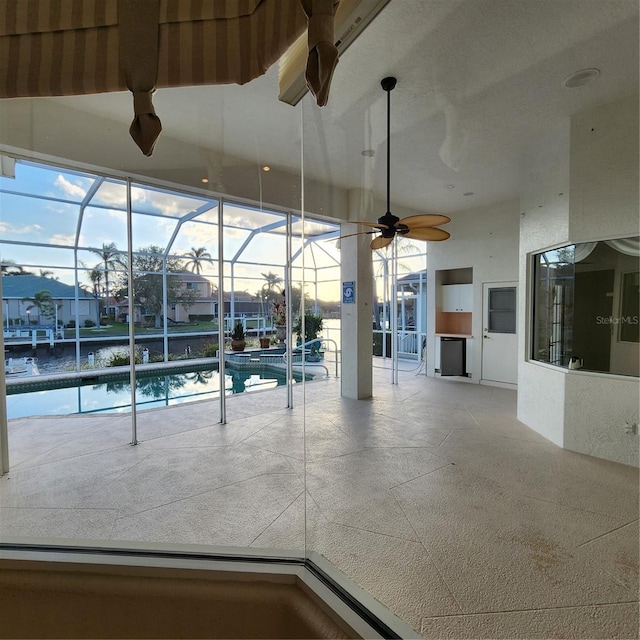 view of pool with ceiling fan