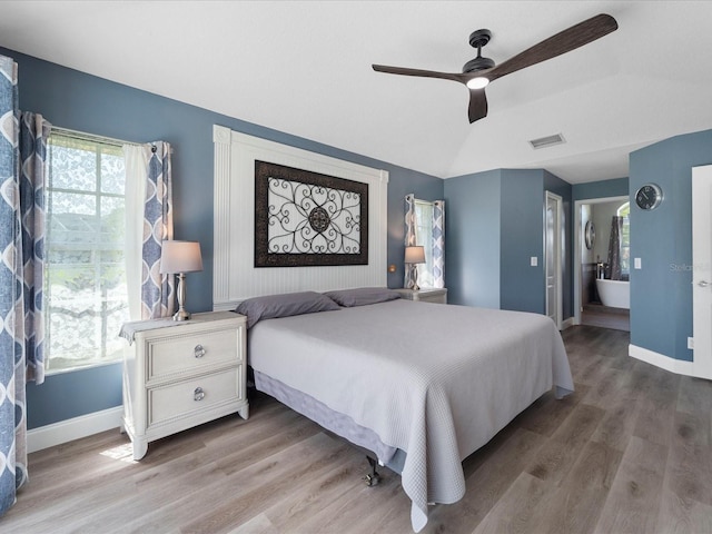 bedroom featuring light hardwood / wood-style flooring and ceiling fan