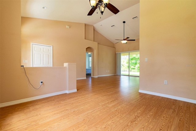 unfurnished room featuring ceiling fan, high vaulted ceiling, and light hardwood / wood-style flooring