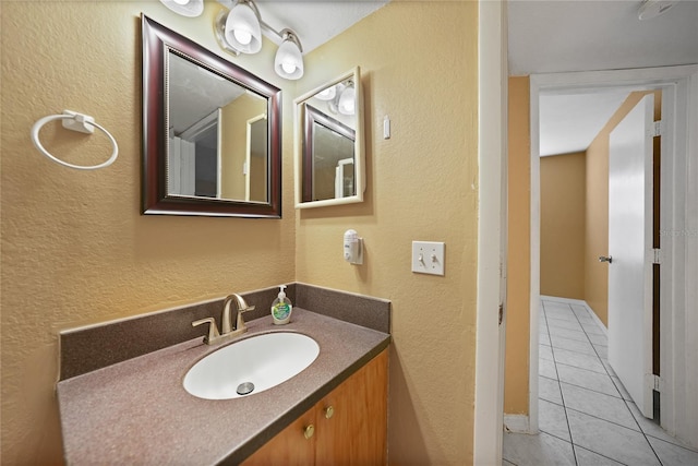 bathroom featuring vanity and tile patterned flooring