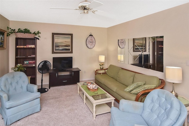 living room with carpet flooring and ceiling fan