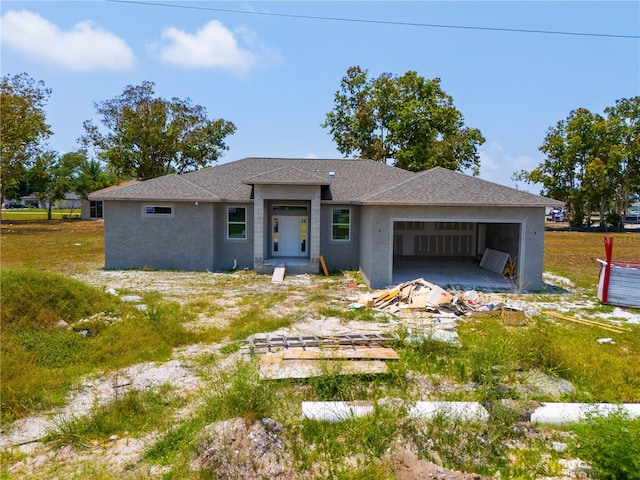 view of front of home featuring a garage