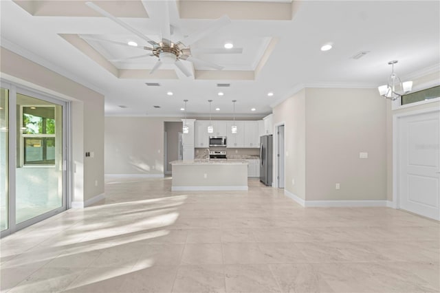 unfurnished living room featuring ceiling fan with notable chandelier, ornamental molding, and coffered ceiling