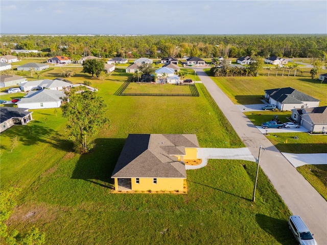 birds eye view of property with a residential view