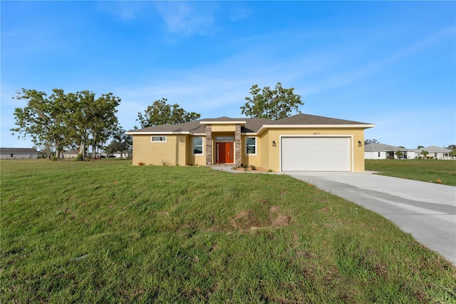 view of front of home with an attached garage, stucco siding, concrete driveway, and a front yard