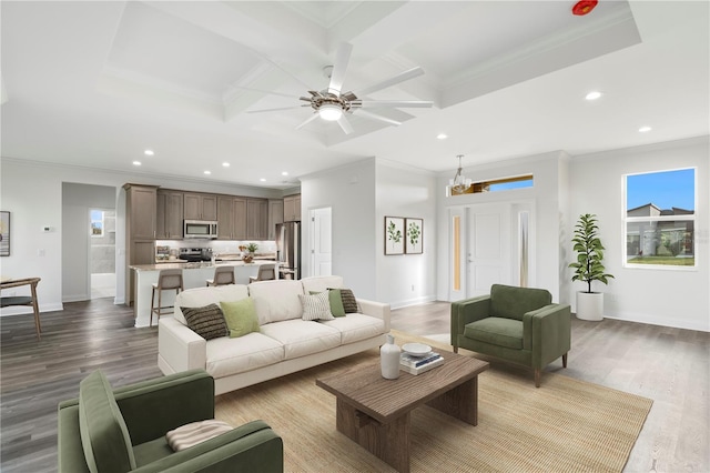 living room with coffered ceiling, wood finished floors, and a wealth of natural light