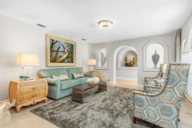 living room featuring light tile patterned floors