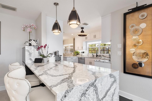 dining space featuring sink