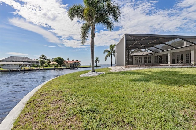 exterior space featuring a water view, a lanai, and a dock