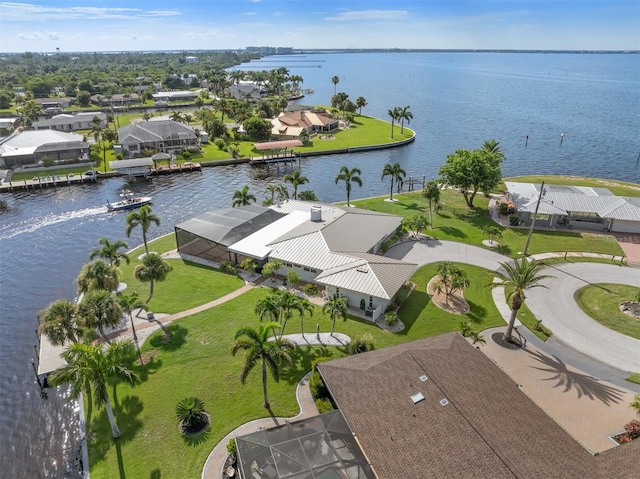 drone / aerial view with a water view