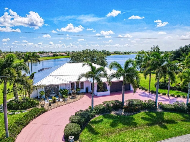 view of community with a water view