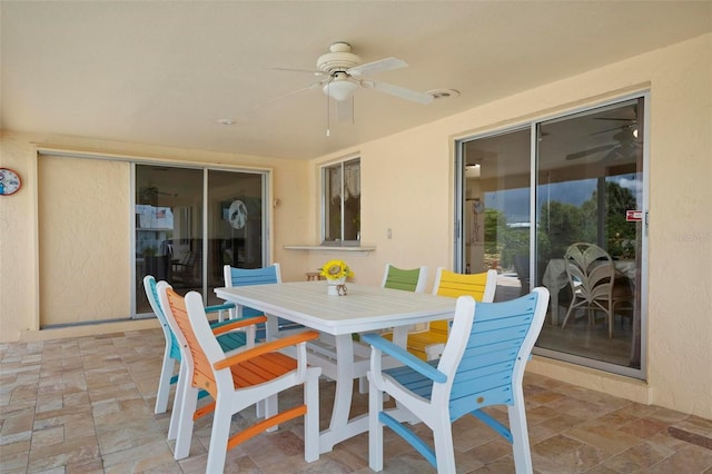 view of patio with ceiling fan