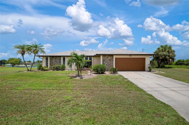 ranch-style home with a front lawn and a garage