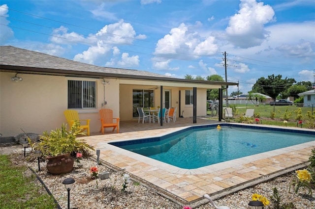 view of pool with a patio