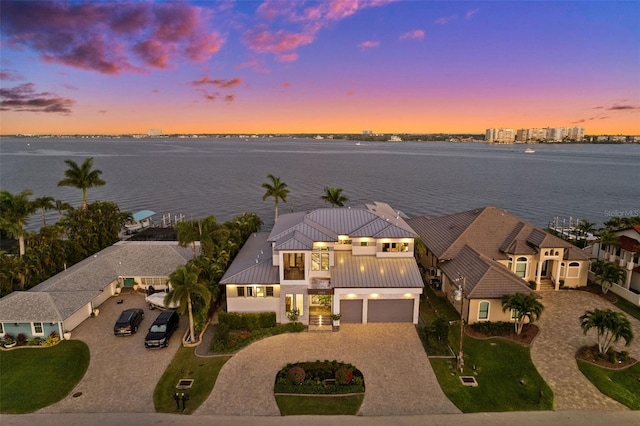 drone / aerial view with a water view