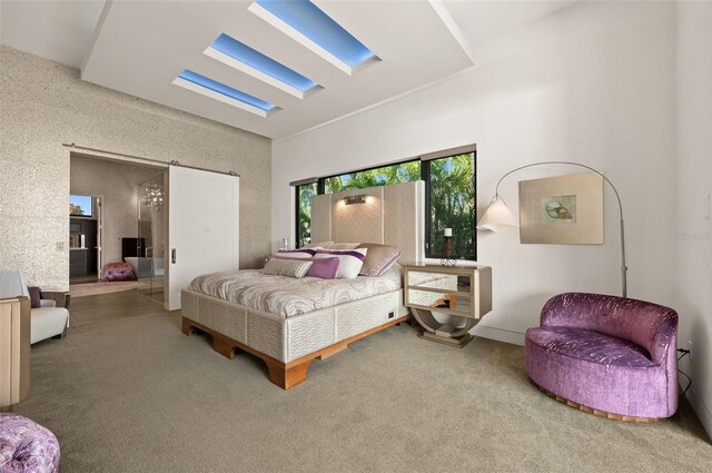 bedroom with carpet flooring and a skylight