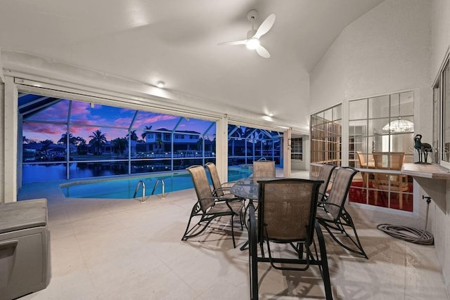 interior space featuring ceiling fan and vaulted ceiling