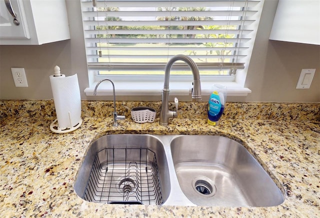 details with stone counters and sink