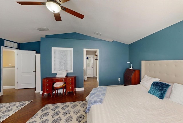 bedroom with lofted ceiling, dark wood-type flooring, and ceiling fan