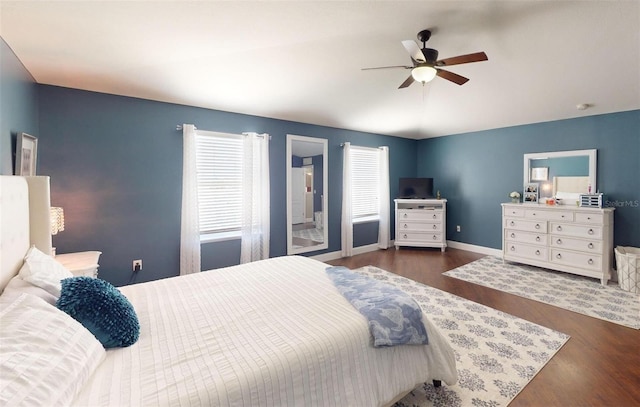 bedroom featuring dark wood-type flooring and ceiling fan